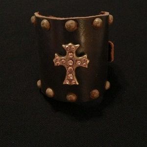 Leather cuff with rhinestone cross